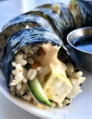 The Spicy Tofu Roll-brown rice, carrot, cucumber, avocado, marinated raw tofu, house siracha aioli. 🌱😋 at Sprout Vegan Cafe in Kihei