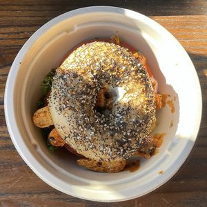 Vegan buffalo chicken sandwich on an everything bagel   at Yorgo's Bageldashery in Norfolk