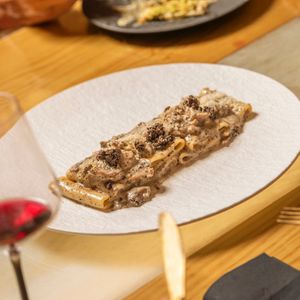 Paccheri ai funghi tartufo e salsiccia. at Choose in Madrid