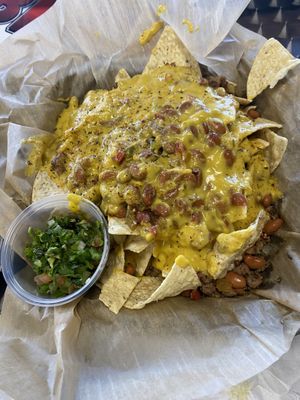 Vegan nachos with impossible meat, pinto beans and homemade cashew cheese!   at Browns Bar B Q  in Midland