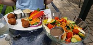 Falafel and hummus appetizer with Nonnie fruit salad at Ivy's Bohemia House in Chesterton