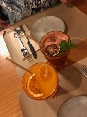 Orange juice & watermelon and red fruits juice at Habitat in Leiria