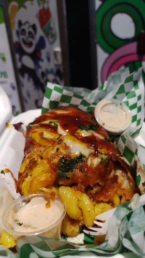 Deep Fried BBQ Chik'n Mac N Cheese Wrap 💚 at Trash Panda Vegan in Phoenix