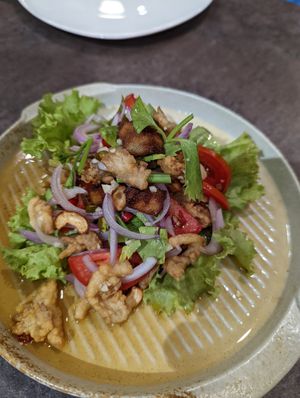 Spicy salad at Munch Box by Nidhi in Bangkok