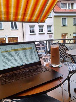 Iced latte on the balcony at au contraire in Freiburg
