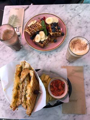 Grilled cheese and coconut waffles. at OM NOM NOM CAFÉ in Munich