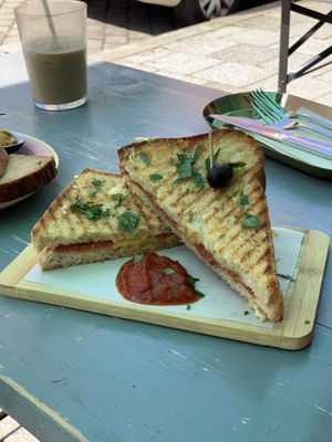 Cheese toastie + salami  at OM NOM NOM CAFÉ in Munich