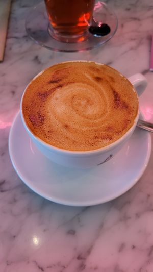 Cappuccino at OM NOM NOM CAFÉ in Munich