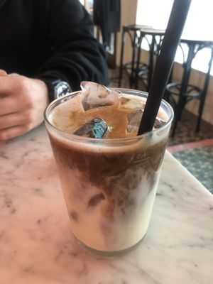Iced latte (hopefully with biodegradable straw)  at OM NOM NOM CAFÉ in Munich