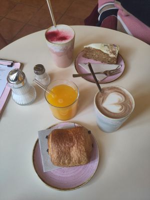 Chai Latte, carrot cake, dirty hot chocolate, pain au chocolat, fresh orange juice at OM NOM NOM CAFÉ in Munich
