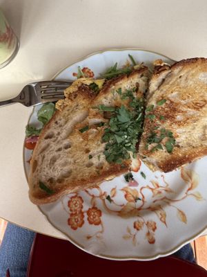 Vegan bacon cheese sour dough sandwich   at OM NOM NOM CAFÉ in Munich