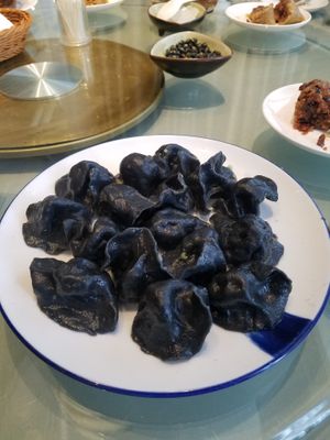 The carbon dumplings stuffed with mushrooms was a pleasant surprise.  at Tianchu Miaoxiang - Chaowai in Beijing
