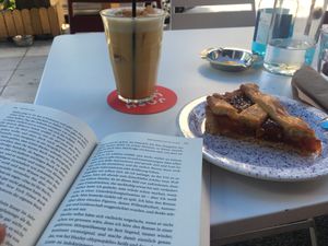 Turmeric Ginger Latte (with plant based milk) and a delicious cake at Joshua Tree Cafe in Athens