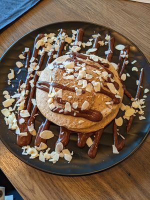Custom pancake with chocolate, almonds, and almond butter and chocolate sauce. at Elysian Restaurant in Nicosia