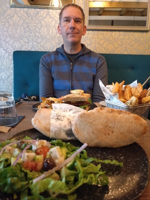 Sheftalia, salad, chips & burger at Elysian Restaurant in Nicosia