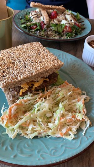 Signature Burger with Coleslaw Salad at Elysian Restaurant in Nicosia