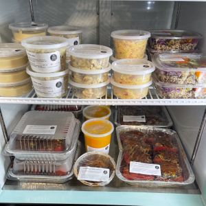 Grab-n-Go fridge - filled with vegan soups, salad dressings, take & bakes, hummus and more. All made in-house.  at B's Salty & Sweet in Columbia