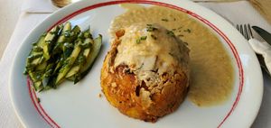 Lunch potato mountain, with vegetables inside and vegan cashew "cheese" at Veggie Garden in Sitges