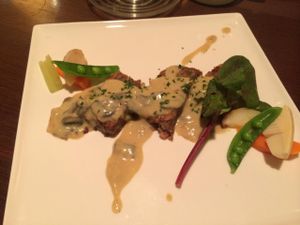 Veggie meat loaf with mushroom demi-glace sauce at Green Italian TORCIA - Shinjuku in Tokyo