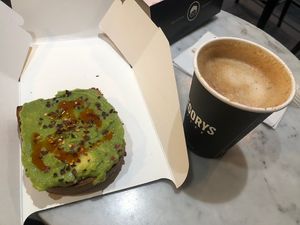 Spicy avo toast and fall oat boy coffee  at Gregory's Coffee - 44th St in New York City