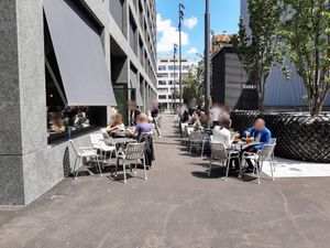 Exterior and outdoor seating at Roots - Maschinenstraße in Zurich