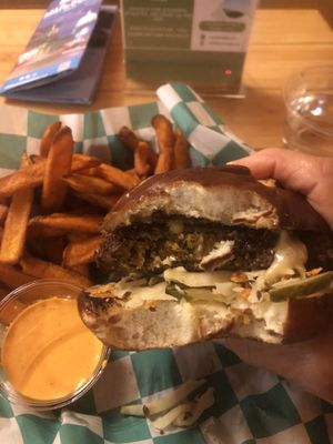 Chickn burger with pretzel bun  at Just Veggiez in Madison
