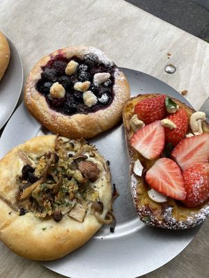 Raspberry-blueberry-chocolate bread, strawberry cashew custard bread, mushroom cream bread  at Universal Bakes and Cafe in Tokyo