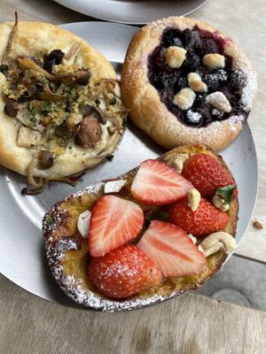 Raspberry-blueberry-chocolate bread, strawberry cashew custard bread, mushroom cream bread  at Universal Bakes and Cafe in Tokyo