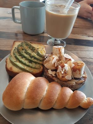 Avo toast, banana caramel toast, and the chelate stuffed pastry (sorry I am ignorant and don't know what it's called) at Universal Bakes and Cafe in Tokyo