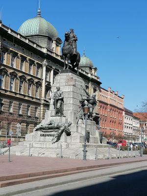 By the statue at Glonojad in Krakow