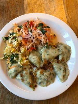 Vegan pierogis and salad at Glonojad in Krakow