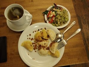 Pierogi with Salads. They offers this Pierogi with different fillings inside. Out of them I think filling of chickpeas flour is the best.  With celery salad it is Yummy. at Glonojad in Krakow