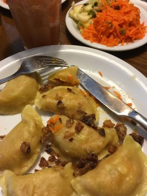 Lentil Pierogi and salads  at Glonojad in Krakow