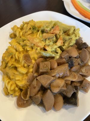 Mac & cheese, curry plantains, vegan notail   at Nourish Philly in Philadelphia