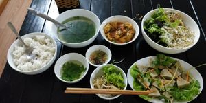 Fake pork sausage + many included sides. Huge meal! at Katze Vegan & Vegetarian  in Hanoi