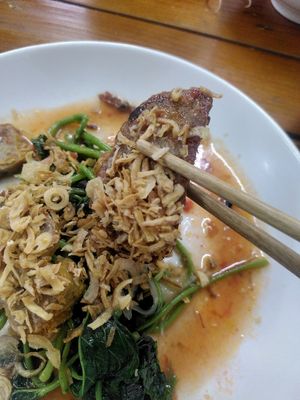 Very tasty vegan chicken with sauteed spinach at Katze Vegan & Vegetarian  in Hanoi