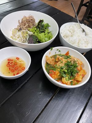 Fresh rice and tofu in tomato sauce as one of the free side dishes  at Katze Vegan & Vegetarian  in Hanoi