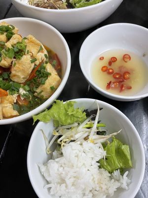 Delicious sauce, tofu, greens, rice and soup comes with every dish for free  at Katze Vegan & Vegetarian  in Hanoi