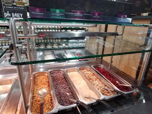 Breakfast toppings for parfait, all vegan except chocolate chips at Common Market Food Co-op in Frederick