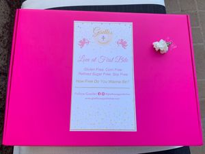 Mixed donut box with a cute flower at Giselle's Vegan Kitchen in Laguna Hills