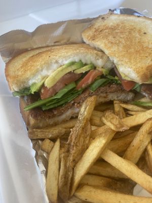 Vegan beyond burger with avo, vegan cheese and vegan mayo and fries on the side!   at Nancy's Café in Auburn