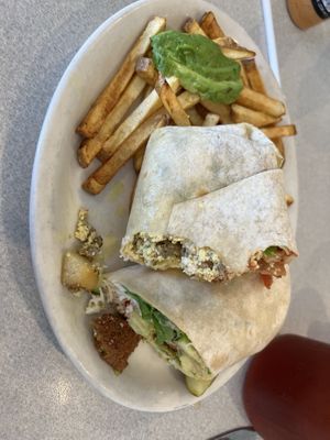 1/2 vegan breakfast burrito and 1/2 hummus wrap with falafel   at Nancy's Café in Auburn