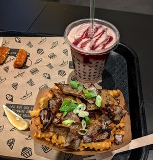 Raspberry milkshake and the kebab fries. You can order different dip's to go with the kebab fries, but for it's plain food for the win at VINCENT - Schönhauser Allee Arcaden in Berlin