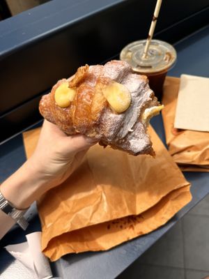 custard croissant and an iced americano 🥰  at Tart Bakery - Queen St in Auckland