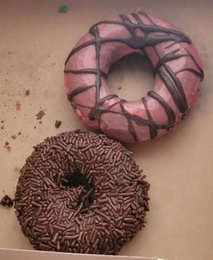 Chocolate Raspberry (top), Triple Chocolate (bottom) at Pandamonium Doughnuts in Champaign
