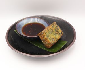 crispy chive cake w chilli-soy dipping sauce at The Golden Peanut  in Reservoir