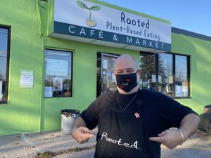 Frank outside at Rooted Plant-Based Eating in Midland