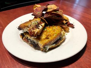 Roasted Tomato Grilled Cheese (Vegetarian/Vegan Option Available)
sharp swiss, mozzarella, multigrain, root chips (sub vegan gouda available) at Molly Malloy's in Philadelphia