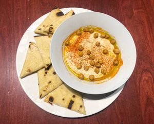 Crispy Chickpea Hummus (Vegan)
crispy chickpeas, olive oil, paprika, herbs, pita  at Molly Malloy's in Philadelphia