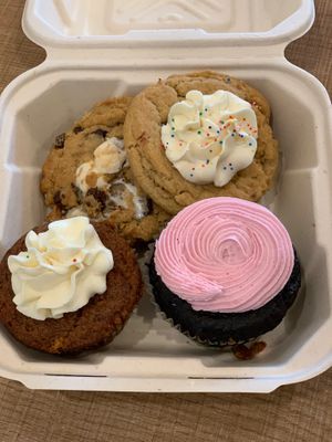S’mores cookie, not sure the name of the other one- but it’s good. Monkey business cupcake- which tasted like carrot cake. And devil wears Prada -chocolate cupcake w/pink icing at Grounds & Greens Cafe in White Rock